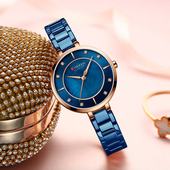 Reloj de pulsera de acero inoxidable resistente al agua con diamantes de imitación de lujo a la moda para mujer